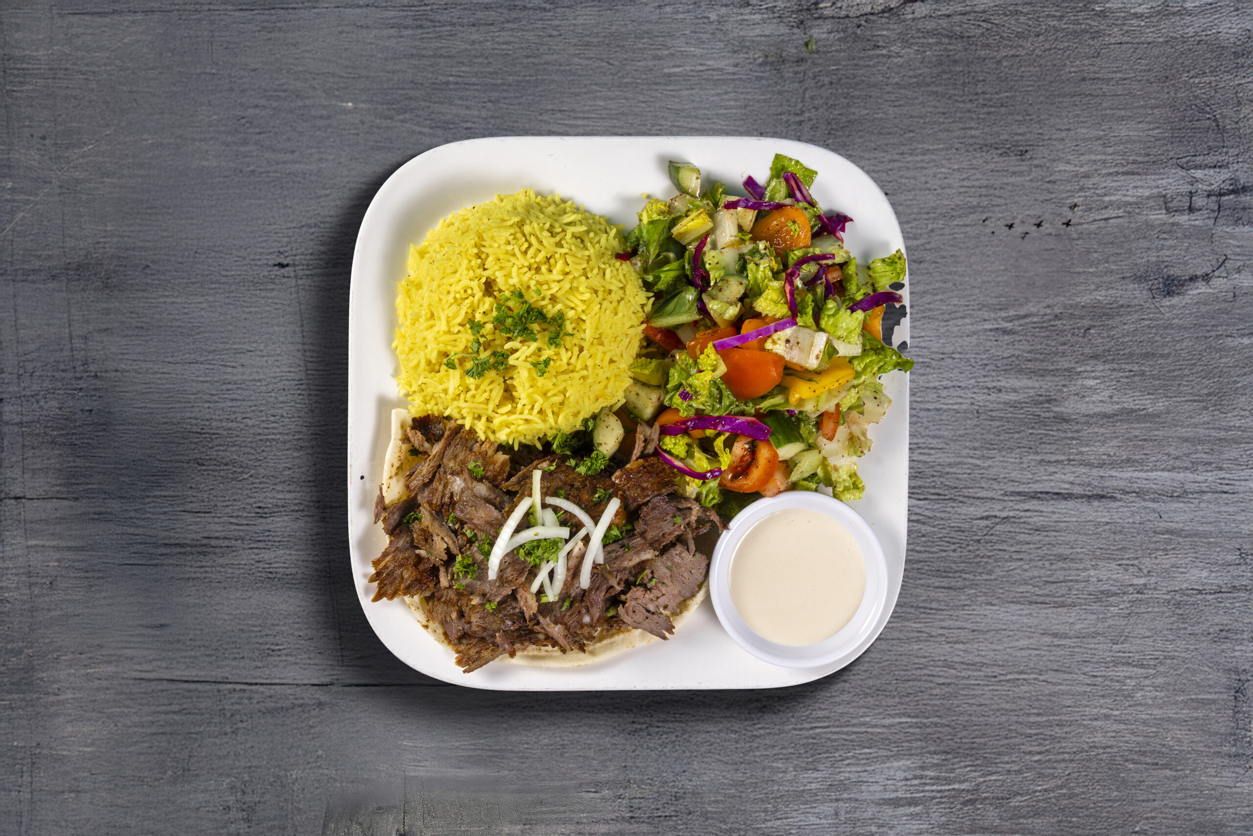 Family-style platters for group bookings at Fairouz